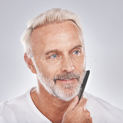 Buy stock photo Beard comb, mature man and face on studio background for growth maintenance, barber cleaning and healthy skincare. Male model, facial and brushing hair care for beauty, aesthetic fashion or cosmetics