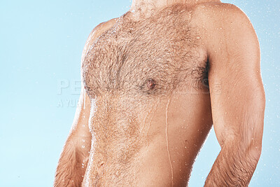 Buy stock photo Wellness, cleaning and shower body of man with skincare for washing routine and cosmetic treatment campaign. Grooming, hydrated and hygiene lifestyle of muscular model in blue studio background.