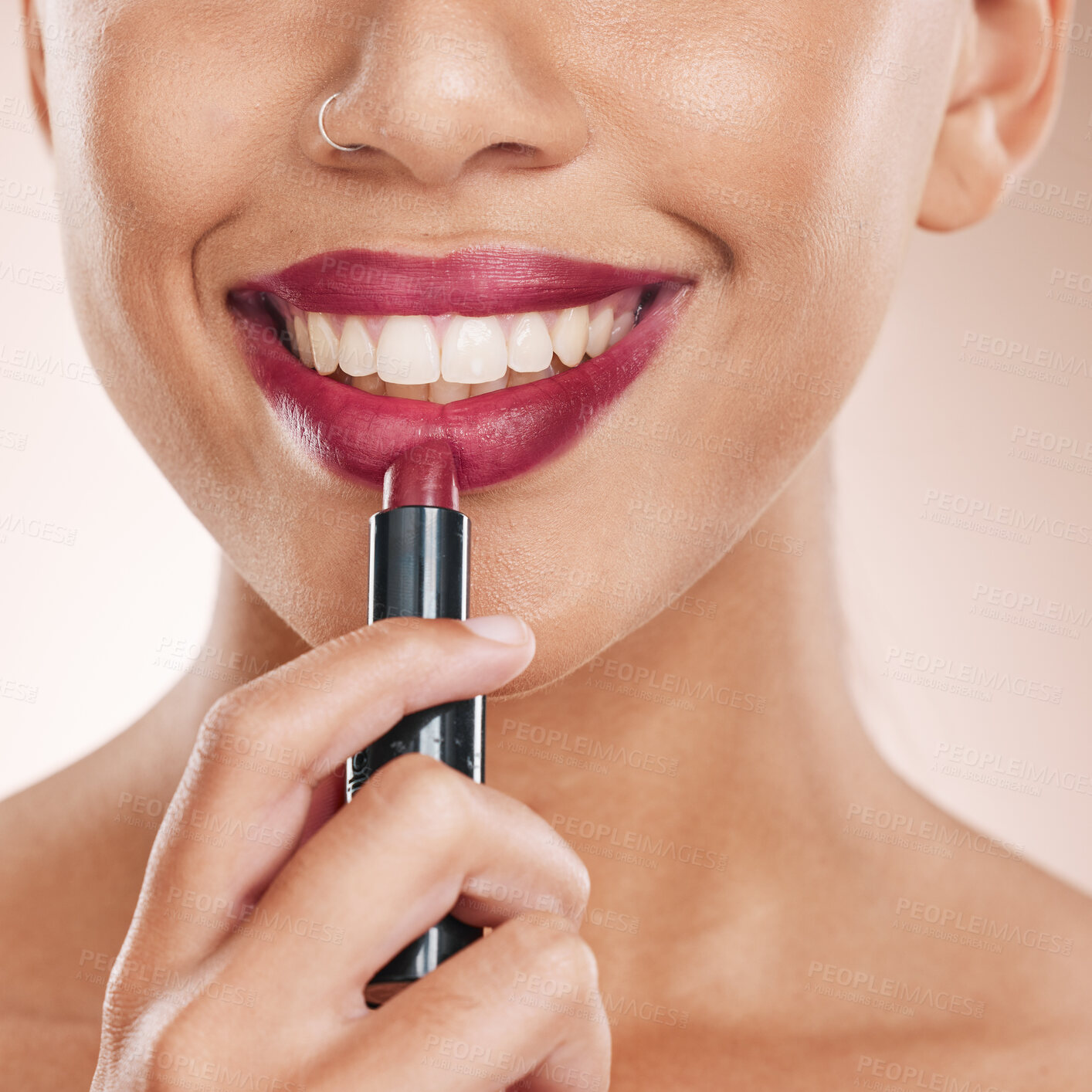 Buy stock photo Lipstick, lips and woman with face and beauty, makeup with cosmetics closeup, teeth and dental against studio background. Cosmetic care, product and facial with smile, hand and skincare wellness