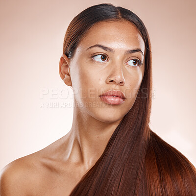 Buy stock photo Hair care, shine and woman thinking of shampoo, hairdresser glow and results from a hair salon on a studio background. Keratin, long hair and face of a model marketing an idea for natural hair health
