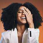 Happy black woman, face and hand with hair and beauty, manicure and hair care with afro against studio background. Funny, pride and cosmetic skincare, facial and natural curly hair texture with laugh