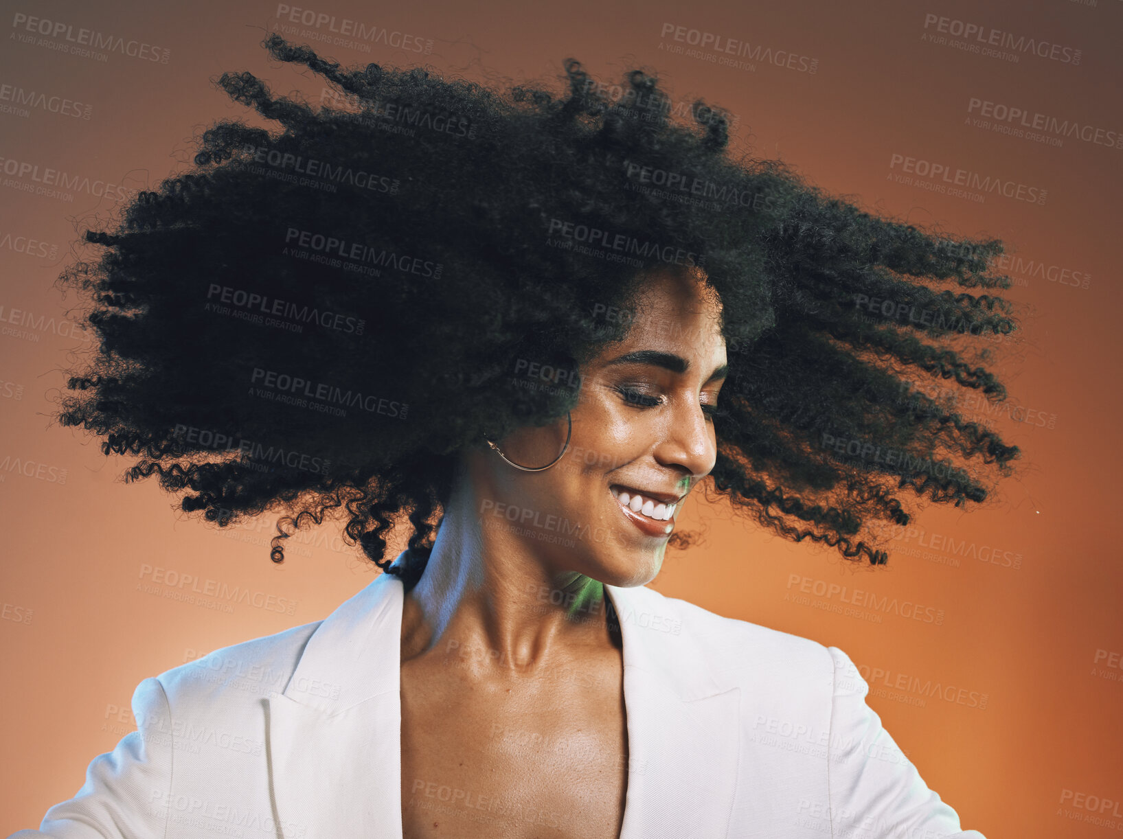 Buy stock photo Natural hair, beauty and black woman with hair care, cosmetics and happiness against studio background. Makeup, dance and freedom with pride in curly hair texture and wellness in skincare headshot