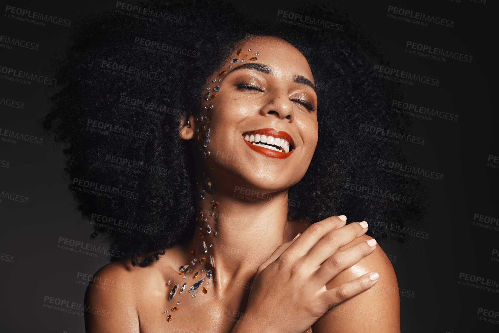 Buy stock photo Woman rhinestones, face or body art jewels on black background studio in fashion sparkle, festival accessory or creative party crystals. Happy smile, afro or beauty model skin or makeup cosmetic gems