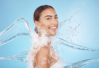 Buy stock photo Happy woman, body skincare or water splash on blue background studio in healthcare wellness, Brazil hygiene maintenance or shower grooming. Smile portrait, beauty model or wet water drop for cleaning