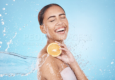 Buy stock photo Water, lemon and woman with happy skincare, beauty or cosmetics product in studio or shower mockup for vegan advertising. Wellness model with fruit in hands and splash for healthy dermatology glow
