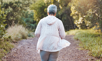 Buy stock photo Fitness, exercise and senior woman on nature trail for running, cardio and a workout for health and wellness outdoor. Elderly female in a forest to run for a healthy lifestyle, body and energy