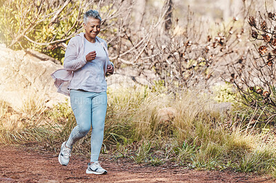 Buy stock photo Running, fitness and senior woman in nature for marathon training, sports health and retirement cardio in Indonesia. Smile, workout and happy elderly runner in a park or mountains for exercise