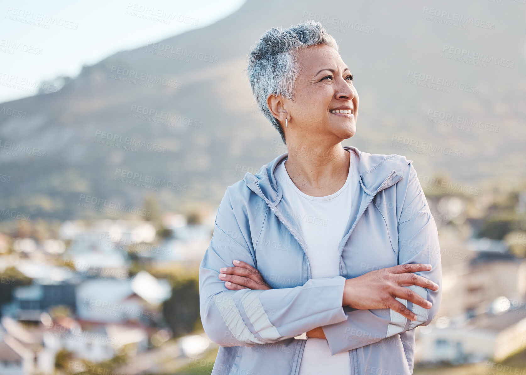 Buy stock photo Elderly woman, thinking and outdoor fitness exercise for calm vision, relax freedom and sports workout in nature. Cardio lifestyle, senior person and athlete smile on mountain top with crossed arms