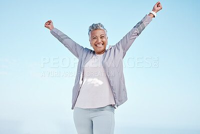 Buy stock photo Excited senior woman with hands in air for exercise, fitness or workout portrait goals, success and achievement on blue sky mockup. Winner, freedom and healthy celebration of elderly runner in nature