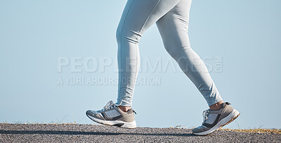 Fitness, nature and legs of a woman running for health, wellness and endurance training in the street. Sports, workout and female athlete doing a cardio exercise for a race, marathon or competition.