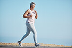 Sports, nature and senior woman doing a cardio workout for health, wellness and exercise in Puerto Rico. Fitness, runner and elderly female athlete running outdoor training for a marathon or race.