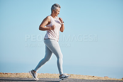 Buy stock photo Sports, nature and senior woman doing a running workout for health, wellness and exercise in Puerto Rico. Fitness, runner and elderly female cardio athlete at outdoor training for a marathon or race.