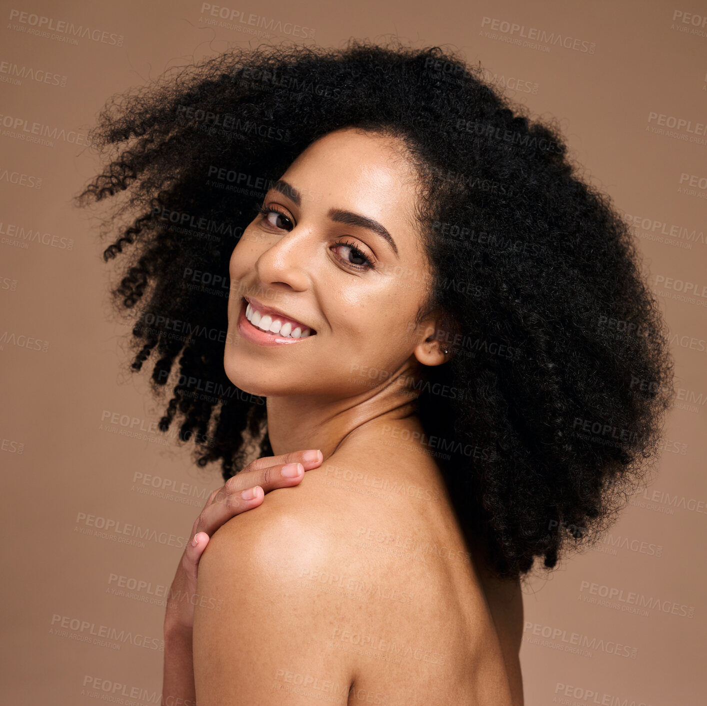Buy stock photo Woman, face skincare or afro haircare on brown studio background in self love, healthcare wellness or body dermatology. Portrait, smile happy or beauty model and natural hairstyle or makeup cosmetics