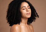 Black woman, studio and skincare beauty with eyes closed, thinking and cosmetic wellness for face, glow or afro hair. Model, soft skin and facial cosmetics, self care and makeup by brown background