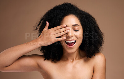 Buy stock photo Hand, face and surprise with black woman and beauty, hair care with shine and skincare with healthy skin glow. Natural curly hair, manicure and cosmetic care with facial against studio background