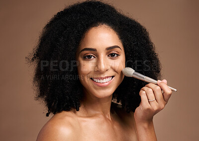 Buy stock photo Beauty, face portrait and black woman with makeup brush in studio isolated on a brown background. Cosmetics tool, skincare and happy female model with product to apply foundation for facial wellness.