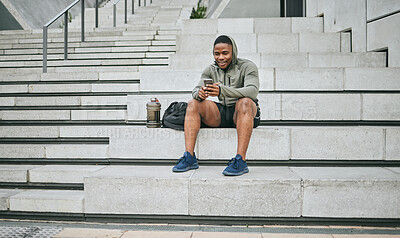 Buy stock photo Social media, phone or black man on steps after fitness training, exercise or workout with a sports bag in Miami, Florida. Social networking, happy or healthy athlete texting, chat or typing online 