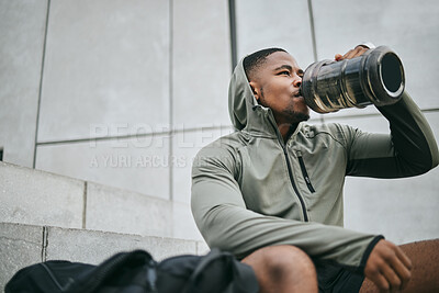 Buy stock photo Fitness, relax or black man drinking water in training or exercise for body recovery or workout in Chicago, USA. Hydration, thirsty or tired healthy sports athlete drinks natural liquid in bottle 