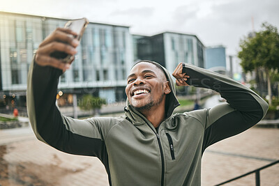 Buy stock photo Fitness, phone selfie and black man in city taking picture for social media or happy memory outdoors in winter. Sports, training or male with 5g smartphone taking a photo showing arm muscle on street