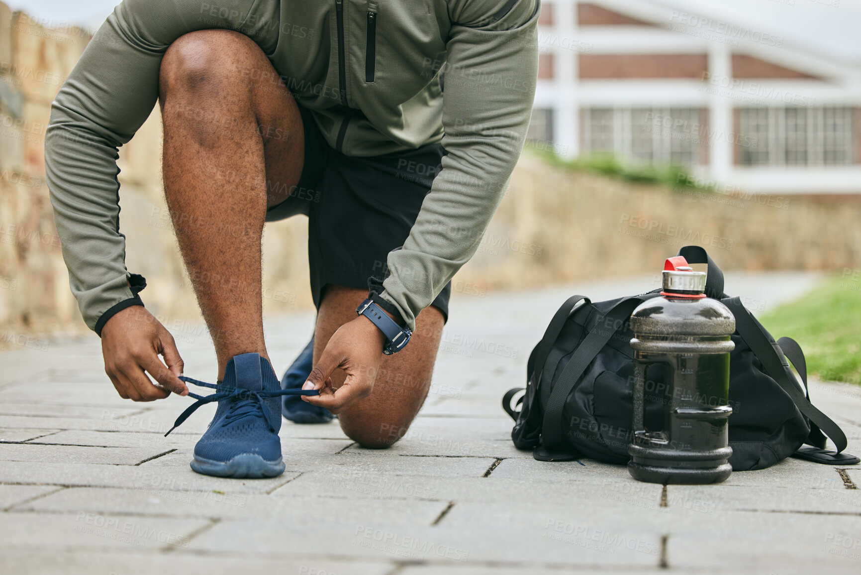 Buy stock photo Fitness, sports shoes and black man tie before outdoor cardio exercise or workout in the park. Sport, runner and African male athlete preparing for endurance training for race, challenge or marathon.