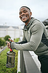Fitness, happy or black man with smile or pride after body training, exercise or workout with a water bottle in Miami. Portrait, relaxing or healthy sports athlete with wellness goals or motivation 