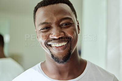 Buy stock photo Portrait, smile and black man on bathroom, home and house for facial skincare in Nigeria. Face of happy guy, morning routine and hygiene for male beauty, self care and cleaning cosmetics in apartment