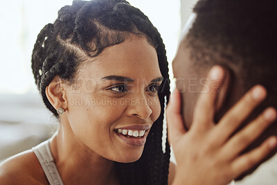 Buy stock photo Black couple, face and smile in morning, bedroom and love with bonding, care and romance in home. Happy couple, eye contact and together for happiness, holiday or vacation in hotel, room or house
