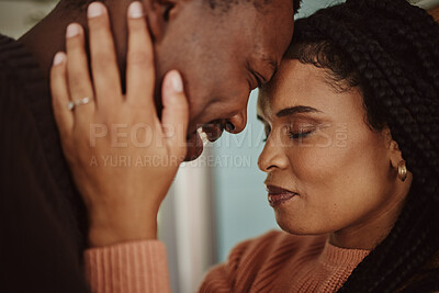 Buy stock photo Black couple, home and love while happy together within a marriage with commitment, happiness and care. Face of man and woman with trust and support while in kitchen to bond in a house or apartment