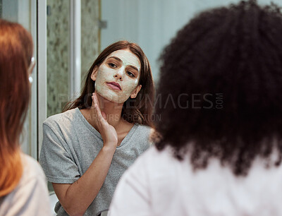 Buy stock photo Women, bathroom skincare or face mask bonding in house, home and hotel spa wellness, girls hospitality or healthcare grooming. Friends, people or beauty facial product for wellness cleaning in mirror