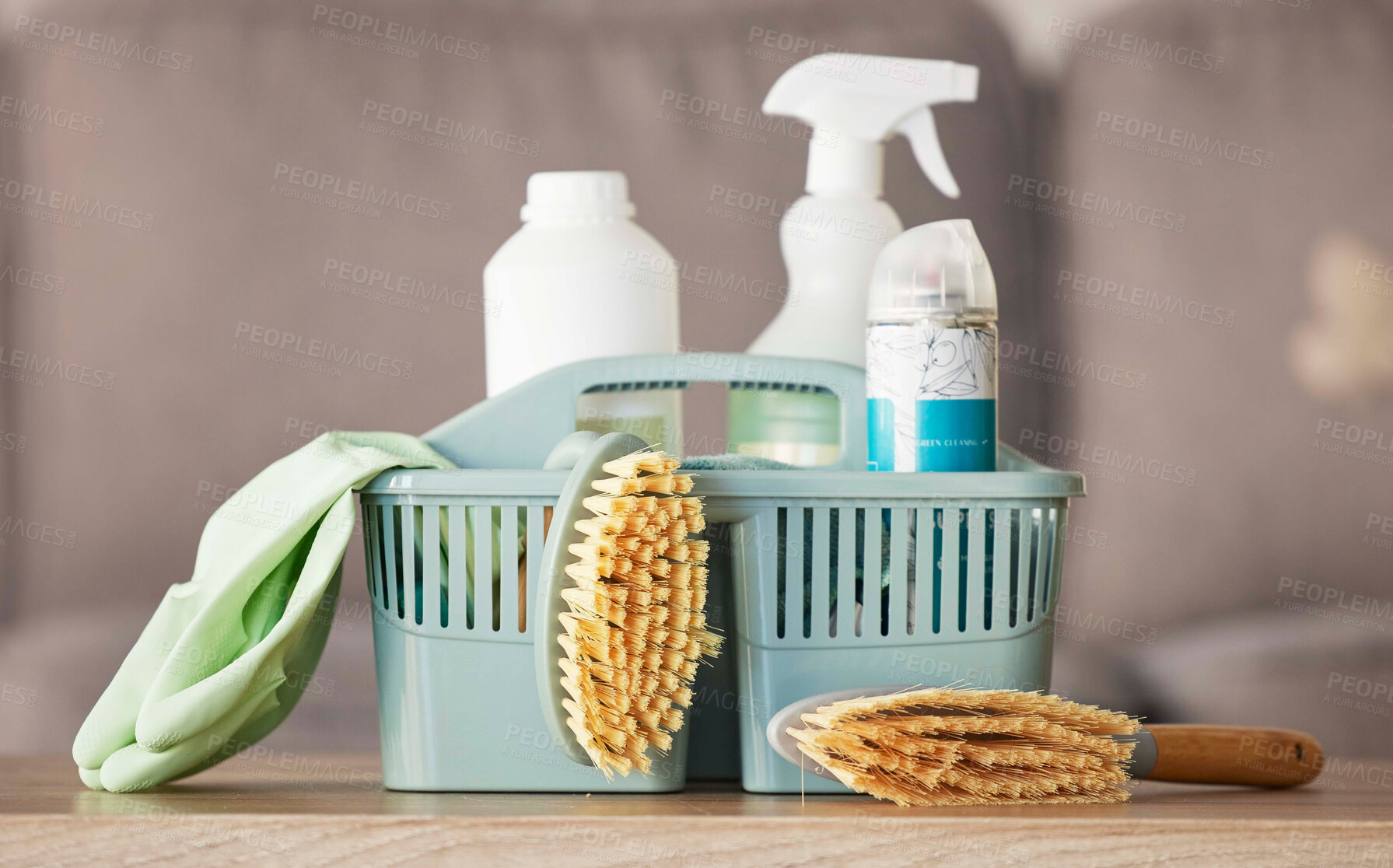 Buy stock photo Product, basket and cleaning with a brush, supplies or detergent on a wooden table surface for housework. Bacteria, living room and empty room with a container of disinfectant in a house or home