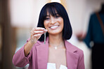 Woman, key and new start after buying a house, property or space for a small business with a smile and pride. Portrait of female tenant with keys of rental to unlock opportunity or apartment