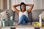 Relax, peace and thinking black woman cleaning the living room, content and happy in clean home. Idea, calm and African cleaner on the sofa to rest after housework with a smile in an apartment