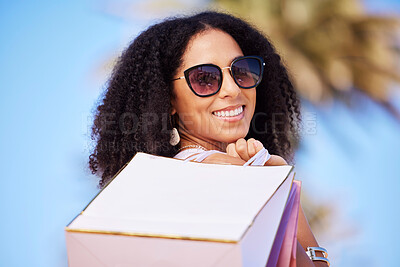 Buy stock photo Freedom, summer and girl with shopping bag portrait and smile in sunny Los Angeles, USA. Happy, consumerism and trendy black woman fashionista girl with retail bags for stylish lifestyle.

