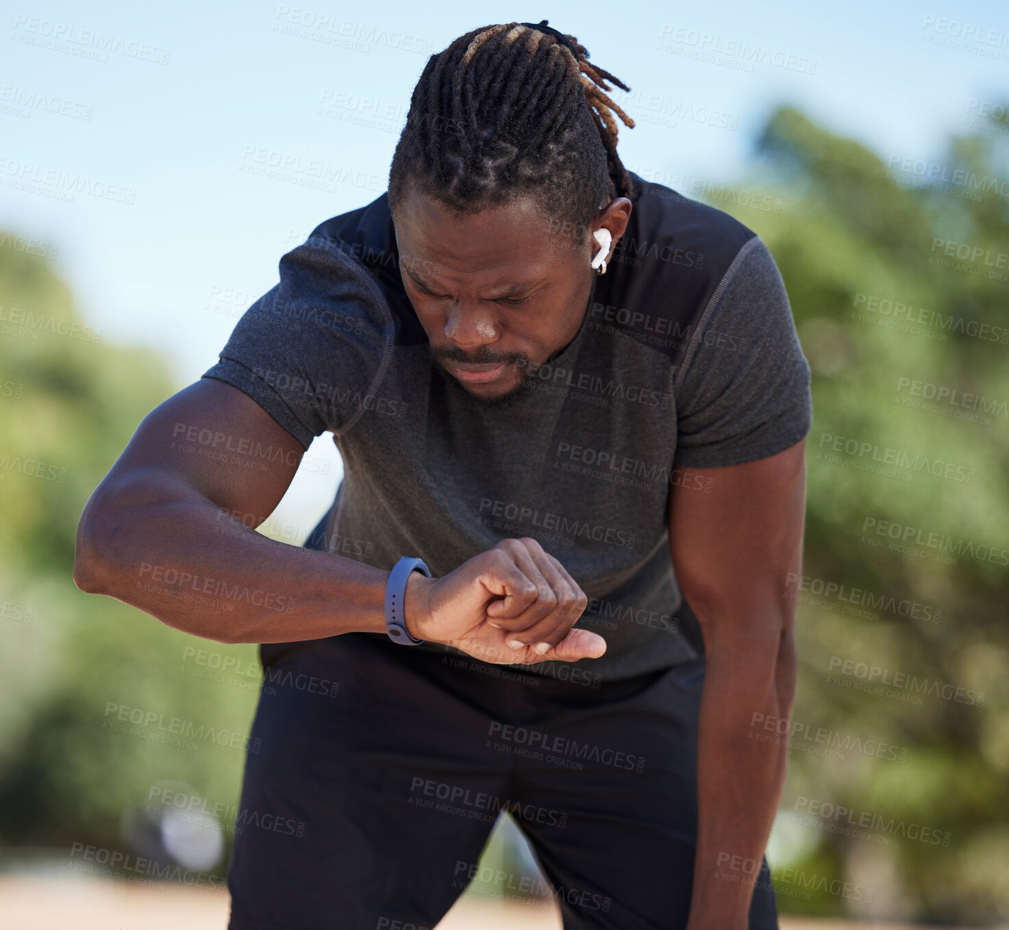 Buy stock photo Fitness, black man and smart watch time for running exercise, workout challenge or healthy marathon training. Stopwatch, sports runner and athlete break to monitor steps count, heart rate or progress