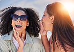 Girl friends, whisper and happy communication of a woman with a secret laughing outdoor. Lens flare, friend conversation and summer holiday travel of people talking about a gossip story on vacation