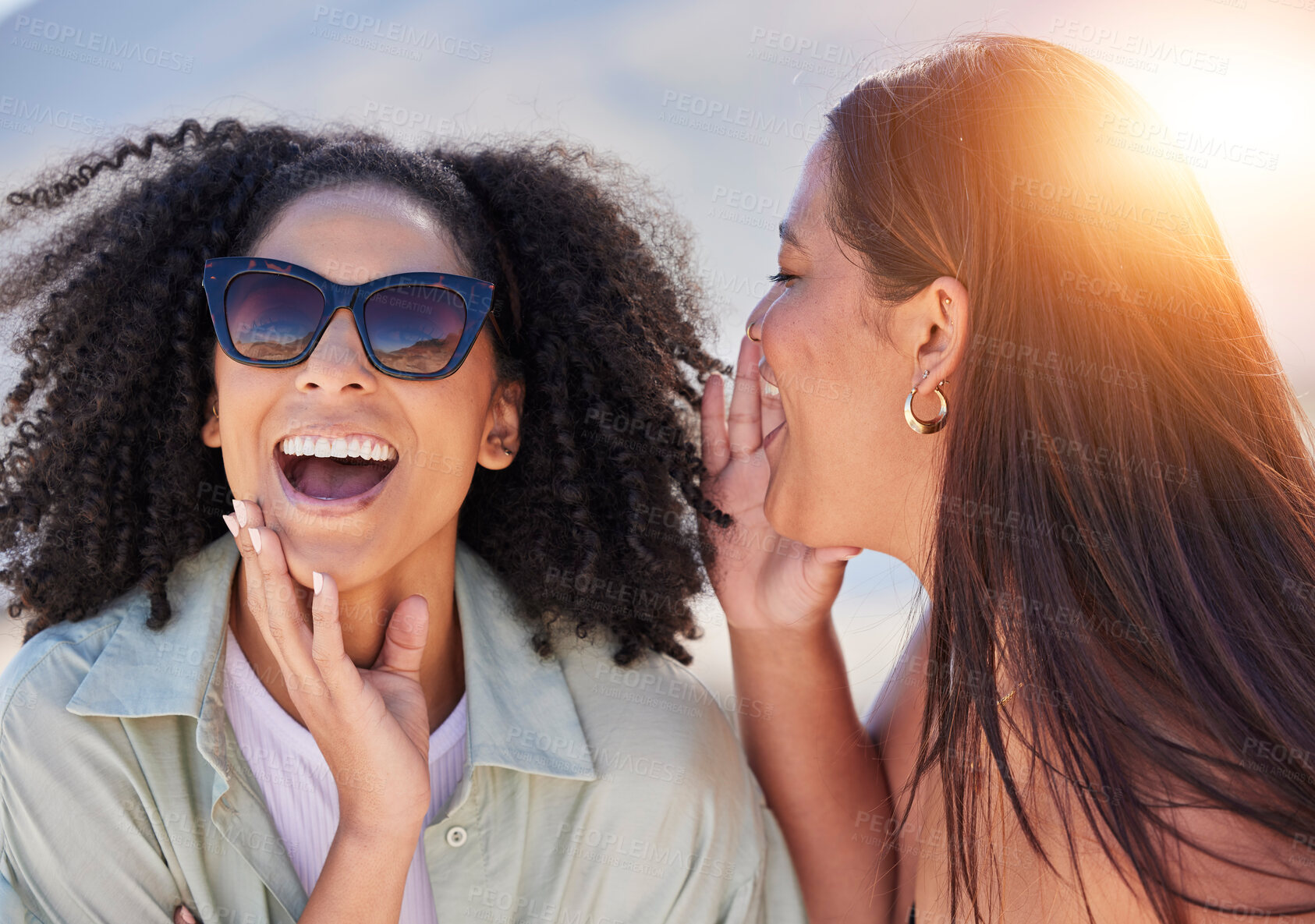 Buy stock photo Girl friends, whisper and happy communication of a woman with a secret laughing outdoor. Lens flare, friend conversation and summer holiday travel of people talking about a gossip story on vacation