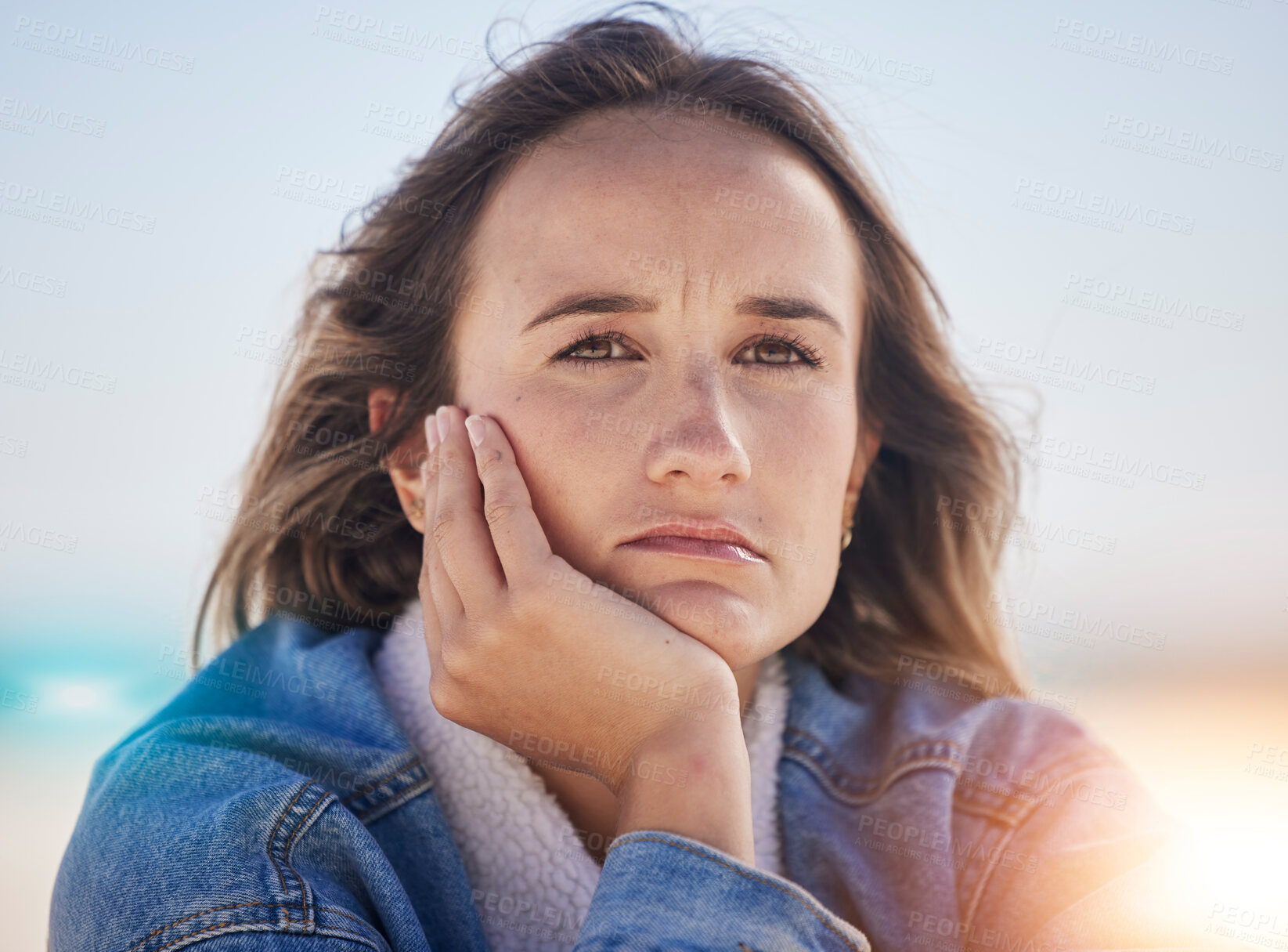 Buy stock photo Sad, thinking and depression with woman at beach feeling stress, exhausted and problems. Mental health, crisis and anxiety with face of girl alone with frustrated, worry and confused by the sea
