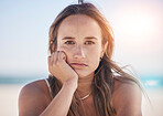 Sad, thinking and depression with woman at beach feeling stress, exhausted and problems. Mental health, crisis and anxiety with face of girl alone with frustrated, worry and confused by the sea