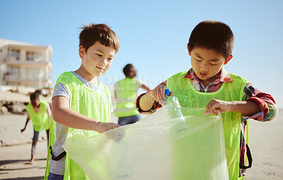 Buy stock photo Recycling, plastic and asian children at beach cleaning for education, learning and community help in climate change project, ngo and charity. Seoul friends with waste, garbage or trash for earth day