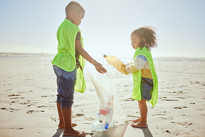 Buy stock photo Children, plastic bottles or beach clean up in climate change, environment sustainability or planet earth recycling. Boy, girl or students in cleaning sea, ocean waste management or community service