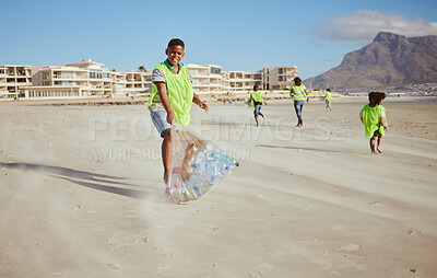 Buy stock photo Boy, portrait and trash collection bag in beach waste management, ocean clean up or sea community service. Happy kids, climate change and cleaning volunteering plastic for nature recycling for school