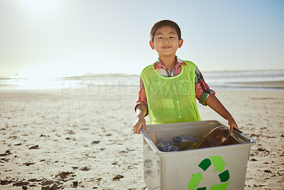Buy stock photo Beach cleaning, recycle box and kid with plastic bottle, recycling portrait and climate change, sustainability and volunteer mockup. Eco friendly activism, community service and boy clean outdoor