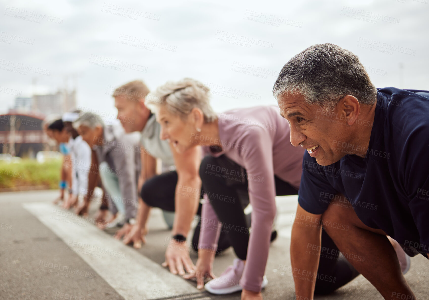 Buy stock photo Start, fitness or senior people in a marathon race with running goals in workout or runners exercise. Motivation, focus or healthy group of sports athletes ready for contest on street road in city