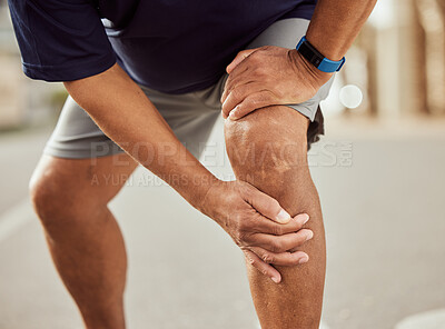 Buy stock photo Fitness, knee pain and hands of black man with muscle ache, painful joint and injury after running in city. Sports, body wellness and  male athlete rest after workout, marathon training and exercise
