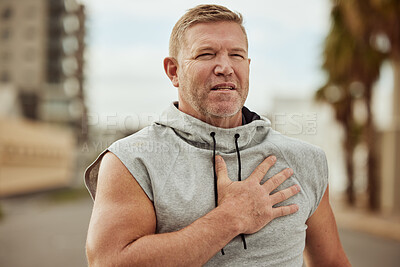 Buy stock photo Face, fitness and man with heart attack in city after running, workout or training accident. Sports, cardio health and mature male runner with chest pain, cardiac arrest or injury, angina or stroke.