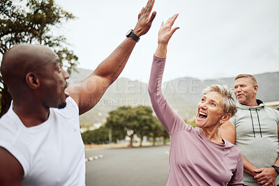 Buy stock photo Fitness, high five and diversity friends or people with support, accountability and teamwork in nature training, exercise or workout. Wellness, community and senior with target, success or goal sign