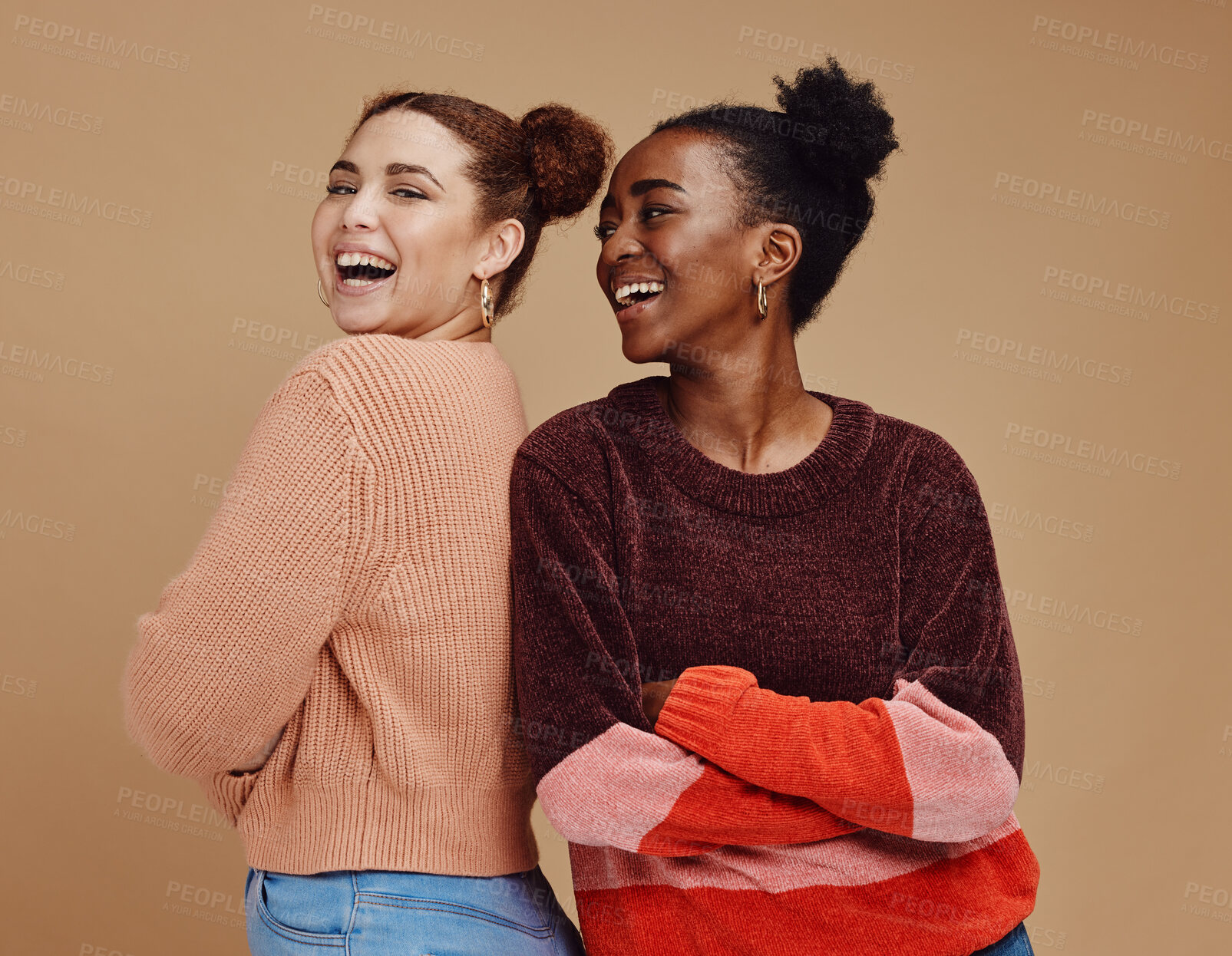 Buy stock photo Happy, smile and women friends in a studio together with fun, freedom and positive mindset. Happiness, excited and interracial girl best friends smiling with style while isolated by brown background.