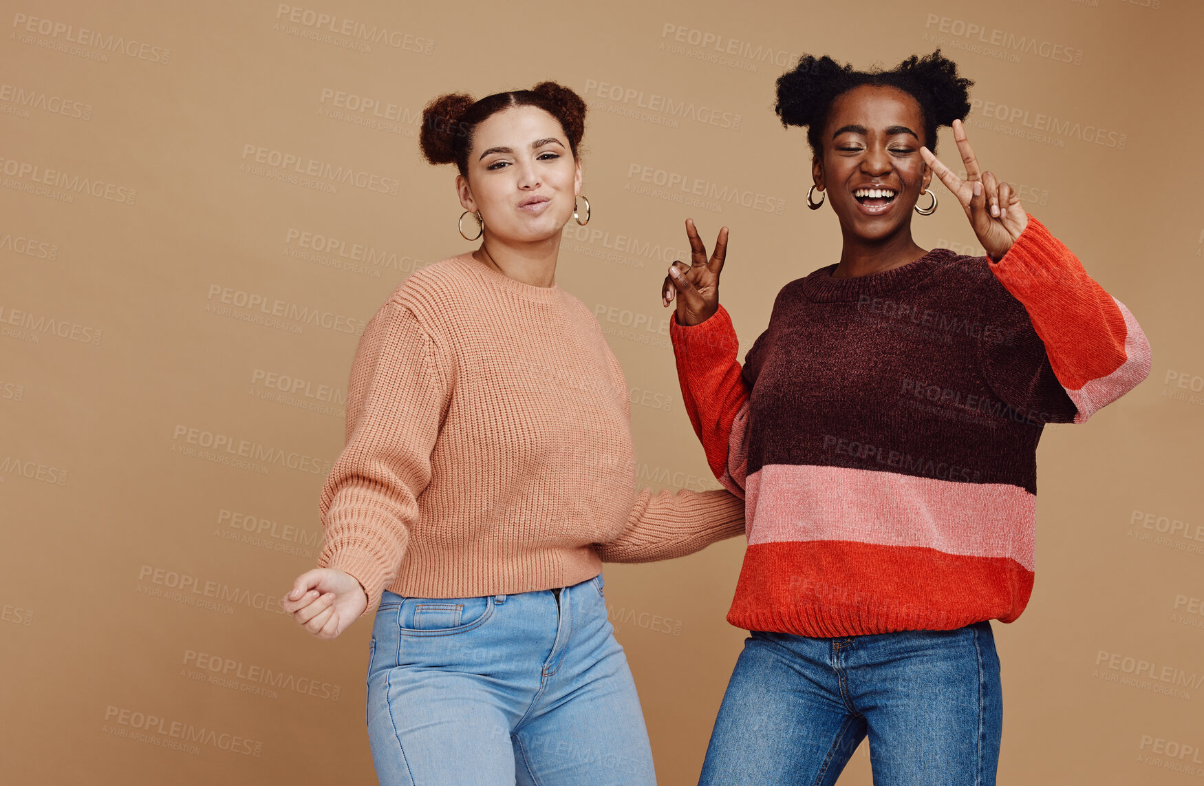 Buy stock photo Peace sign, fashion and women friends in studio with hand gesture, smile and happiness on brown background. Love, friendship and black woman with happy girl for relaxing, cosmetics and emoji together