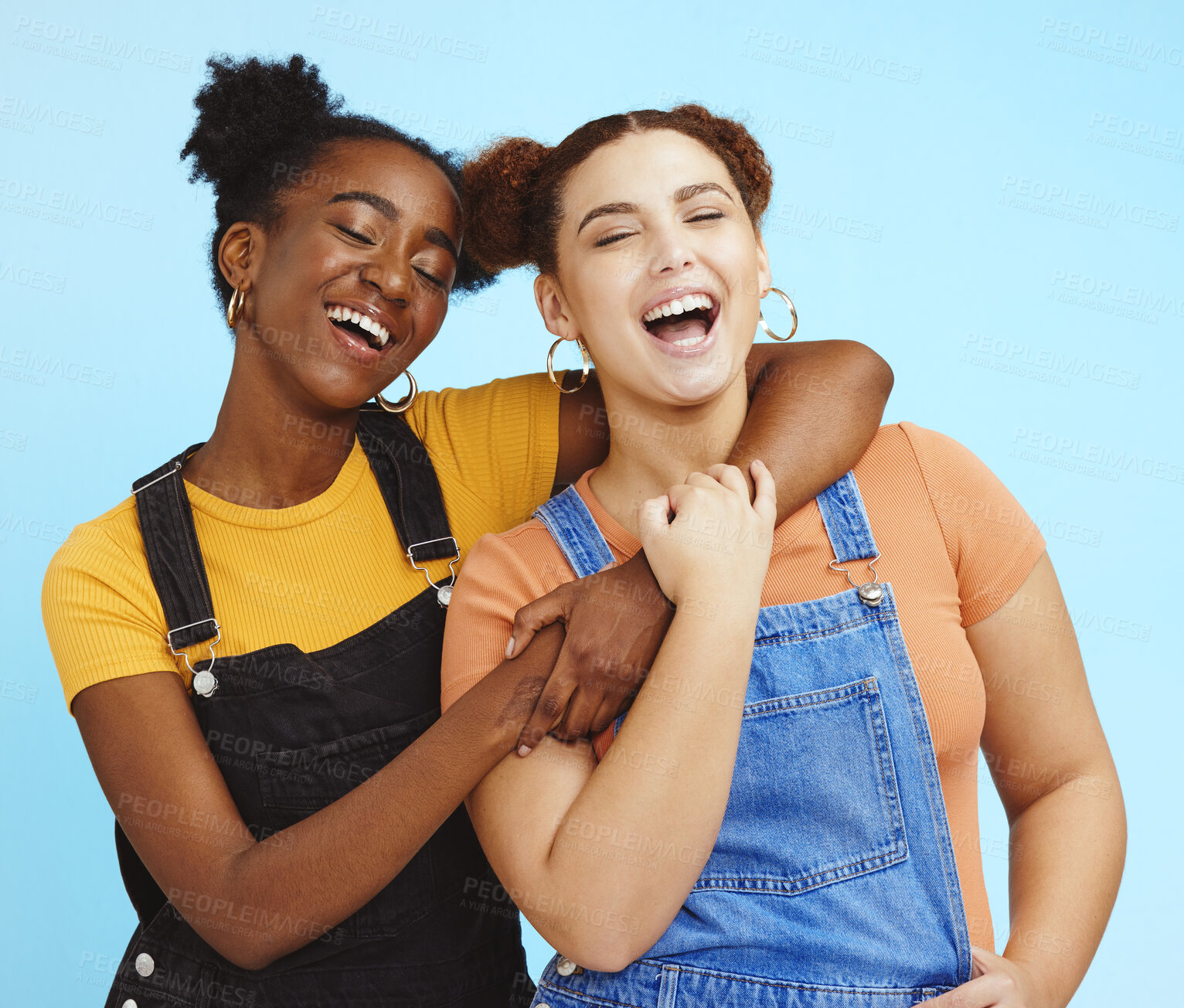 Buy stock photo Happy young women, lesbian and couple with fashion, marketing and lgbt pride, love and fun against blue background. Lgbtq community, gen z youth laughing together and freedom with style and pride