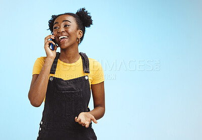 Buy stock photo Communication, happy and talking black woman on a phone call isolated on a blue background. Contact, smile and thinking African girl in conversation on a mobile with mockup space on a studio backdrop